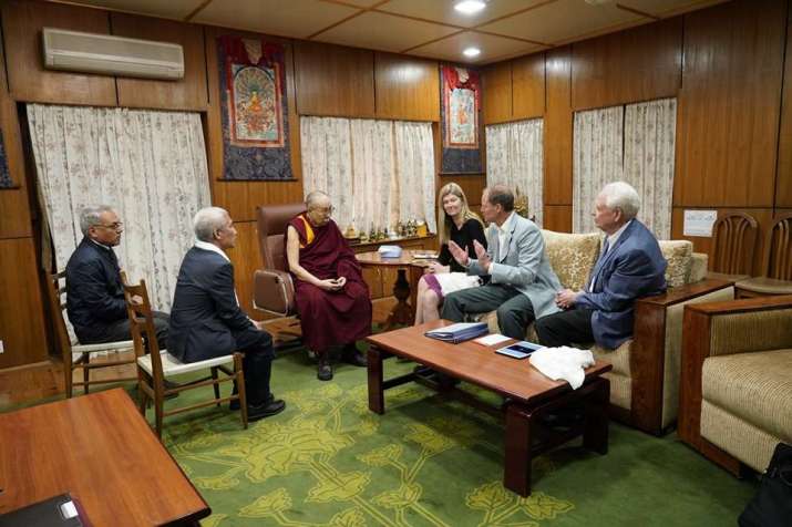 Dr. David Brenner and others discuss Institute for Empathy and Compassion with the Dalai Lama. From facebook.com