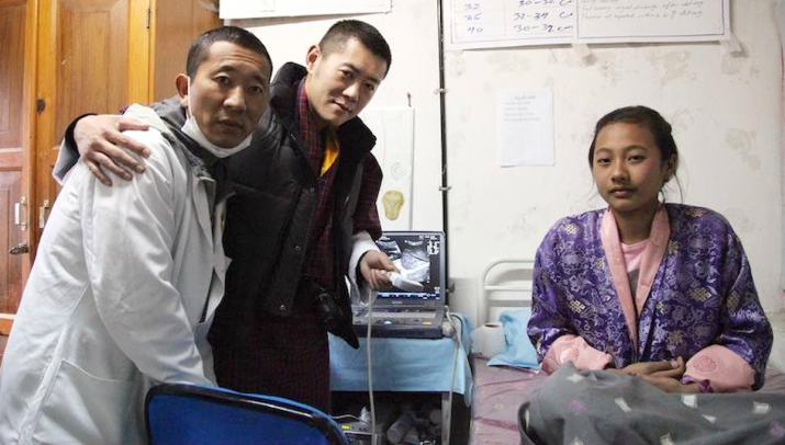 Bhutanese prime minister Lyonchhen Lotay Tshering, left, a trained urologist, has continued to treat patients since taking office. From mothership.sg