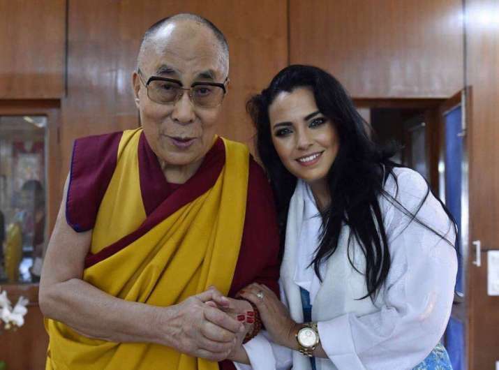 Sónia Gomes with His Holiness the Dalai Lama. Image courtesy of the author