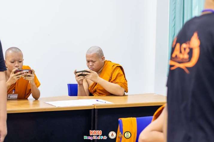 Thai novice monks mid-game. From kotaku.com