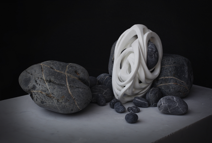 <i>Tensions.intention/being</i> by Elizabeth Turk, 2013; marble and Baja beach stone, 18 x 12 x 12 inches. Image courtesy of the artist and Hirschl & Adler Modern