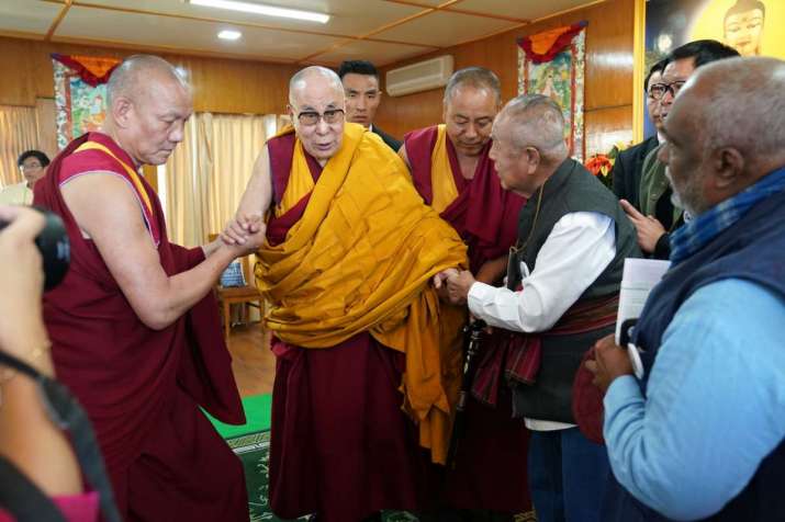 INEB founder and Buddhist social activist Sulak Sivaraksa greets His Holiness the Dalai Lama at Thekchen Choling on Monday. Image courtesy of INEB