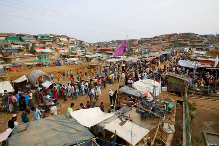 Rohingya refugees at a market in a refugee camp near Cox's Bazar, Bangladesh, March 2019. From voanews.com