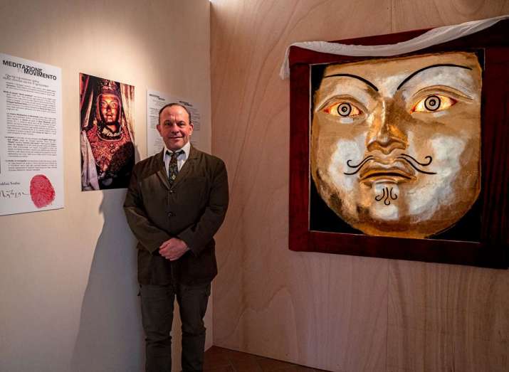 Museo Arte e Cultura Orientale, entrance to the exhibition <i>Meditation in Motion, Footsteps to the Sublime</i>. Guest curator Joseph Houseal, pictured. Photo by Alex Siedlecki