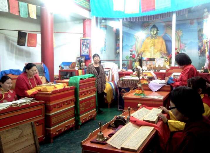 The abbess of the Mongolian Buddhist Women’s Center, Tugs Bayasgalant, with her students, Samten Wangmo from India and Darima Tsynguyeva, center, at the Buddhist Female Datsan Zungon Darzhaling, 2010. Image courtesy of of Zorigma Budaeva