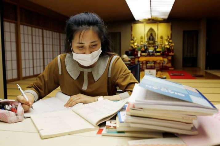 A Vietnamese worker who lost her job amid the coronavirus outbreak studies Japanese at Nissinkutu. From japantimes.co.jp