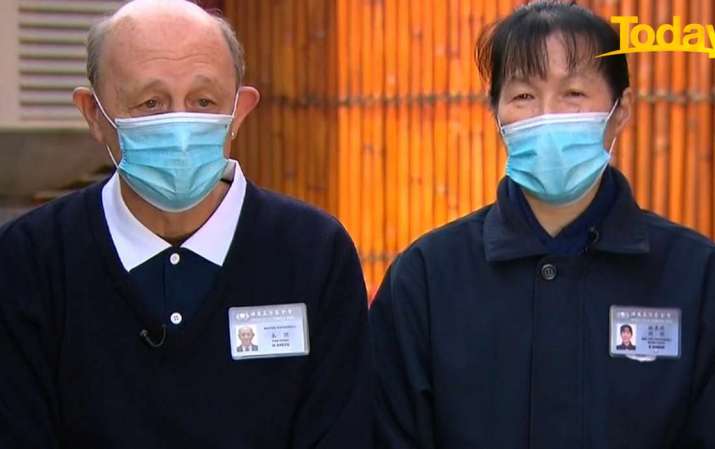 Tzu Chi volunteers working to ensure the safety of frontline workers. From 9now.nine.com.au