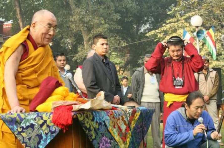 Mitruev translates teachings of His Holiness the Dalai Lama for Russian and Mongolian Buddhists, Sarnath, India, 2009. From savetibet.ru