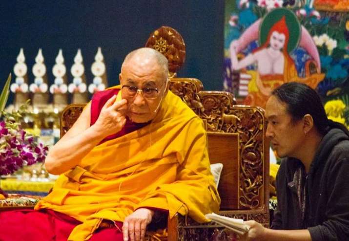 Mitruev translates teachings of His Holiness the Dalai Lama in New Delhi, India, 2013. Image courtesy of Bem Mitruev