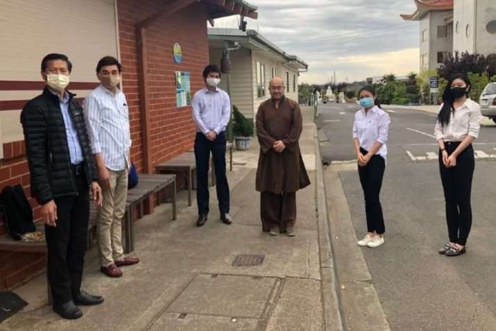 Volunteers from Quang Minh Buddhist Temple and abbott Ven. Thich Phuoc Tan. From sbs.com.au