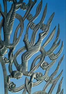 The pagoda’s bronze finial features celestial figures dancing and playing flutes. From yakushiji.or.jp