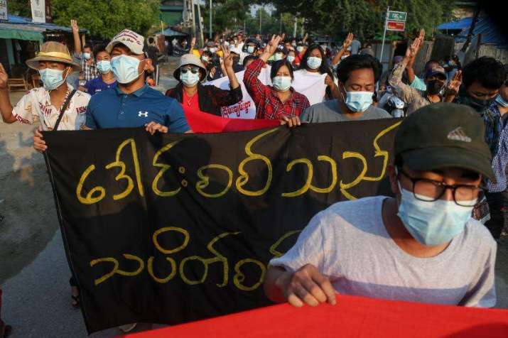 Demonstrators march during an anti-coup protest in Mandalay on 10 May. From myanmar-now.org